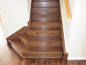 Wooden staircase by Pryor Floor in Colorado Springs, CO