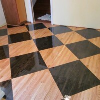 Checkered wooden flooring by Pryor Floor